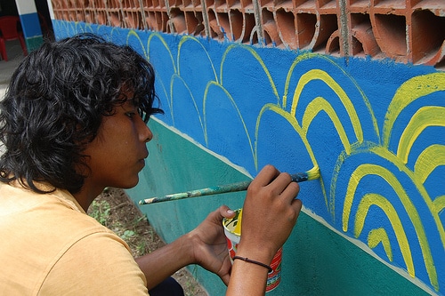Ever painting the border on the #WaterWrites Mural in El Salvador